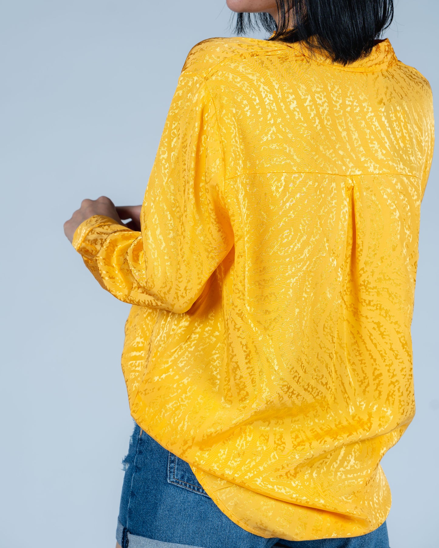 yellow printed shirt